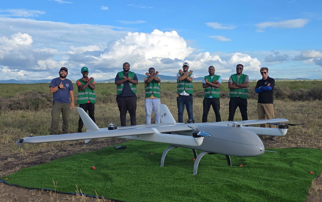 The Thatcher flight operations, engineering and field logistics team with the VTOL cargo drone